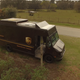 Taking off from a UPS delivery truck.